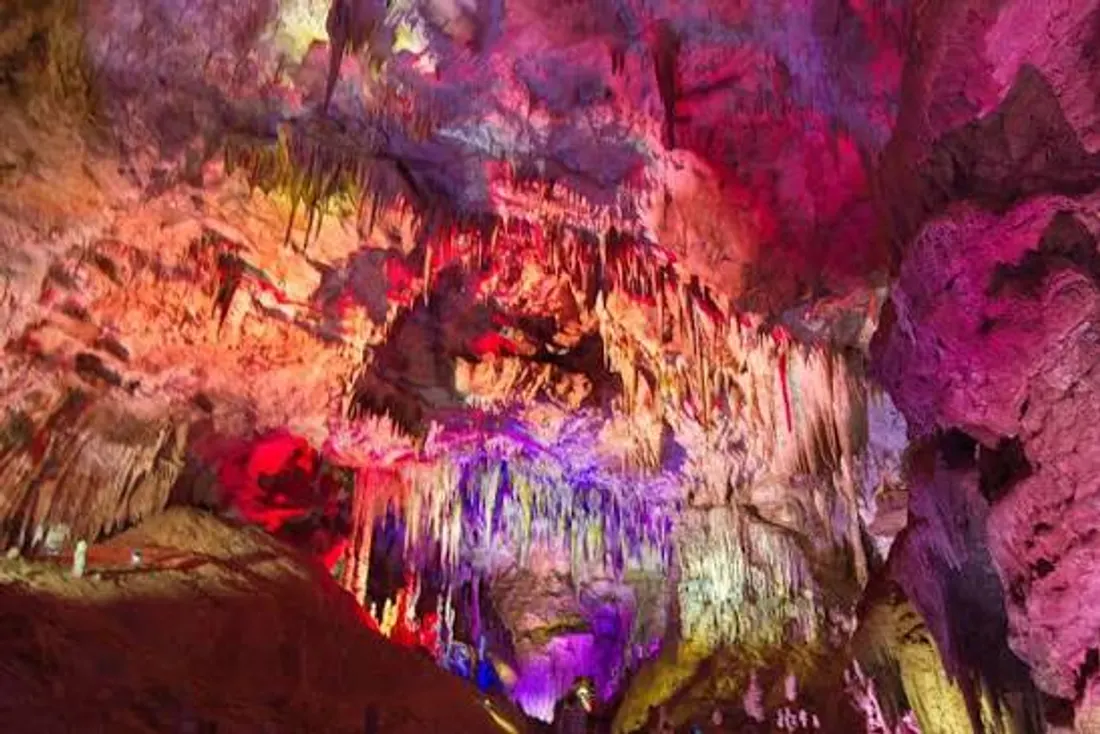 A lit up hall in Prometheus Cave